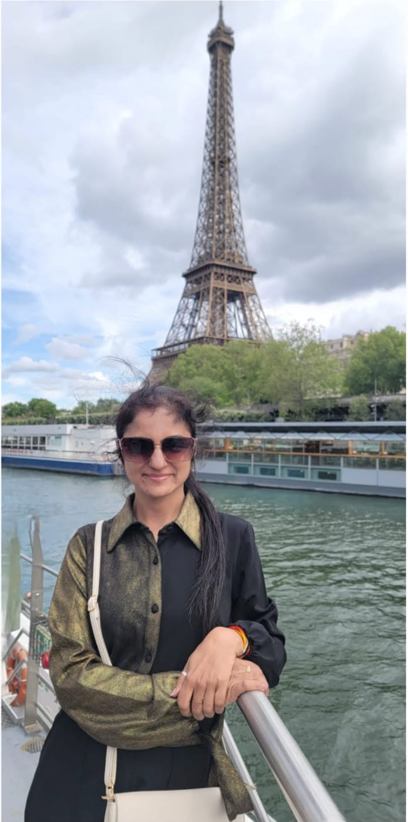 Bhaveshi Chhablani in Paris with the Eiffel Tower behind her